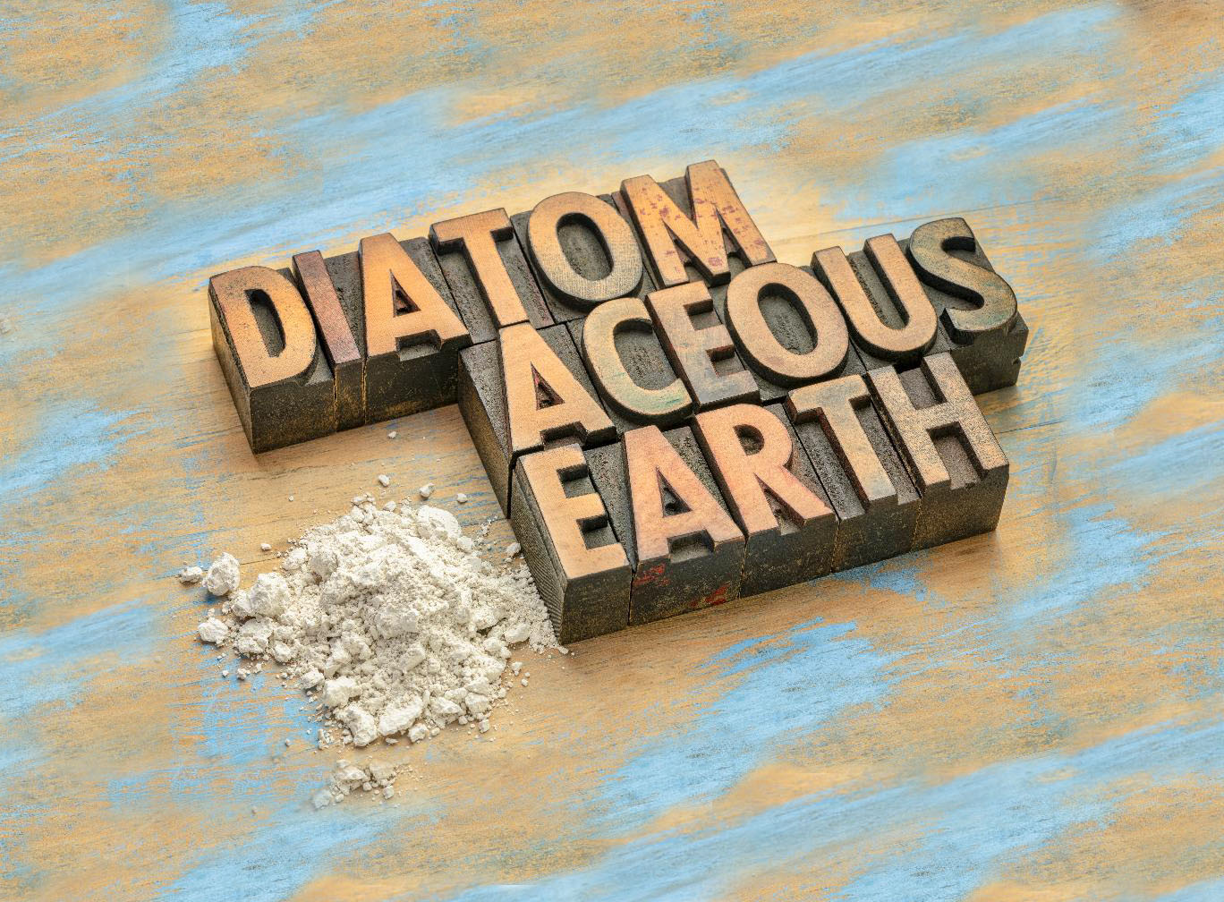 a sign that reads diatomaceous earth next to a pile of diatomaceous earth