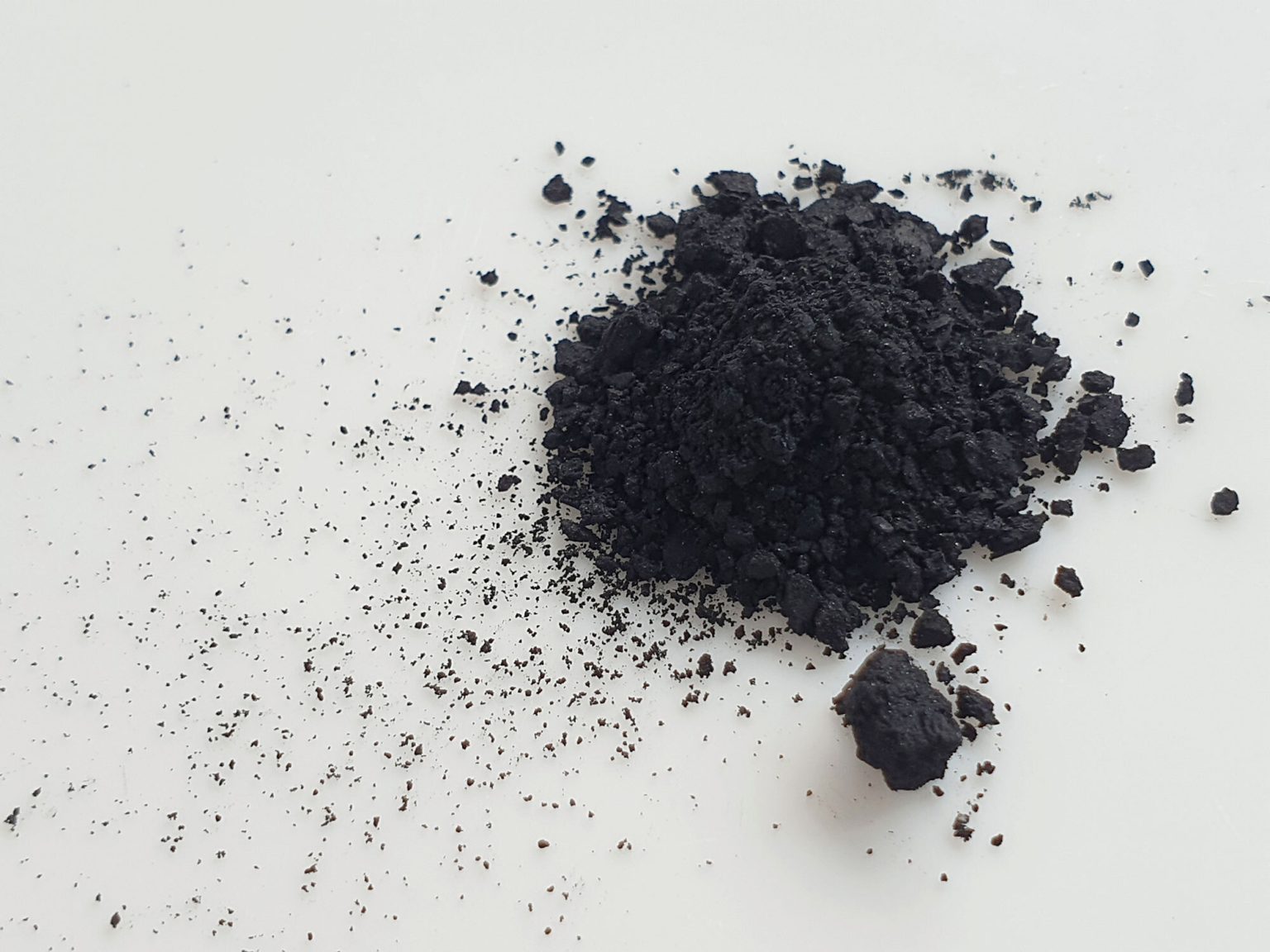 pile of black cupric oxide