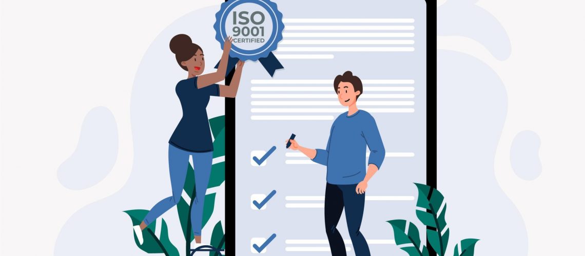 two people placing an ISO 9001 certificate on a compliance checklist