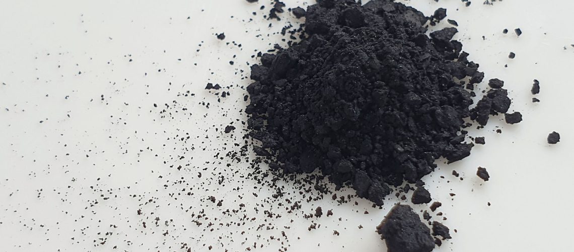 pile of black cupric oxide