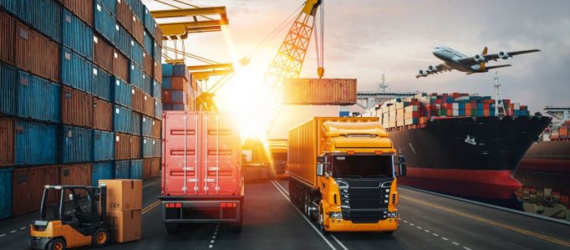 cargo ship, airplane, and truck at a port